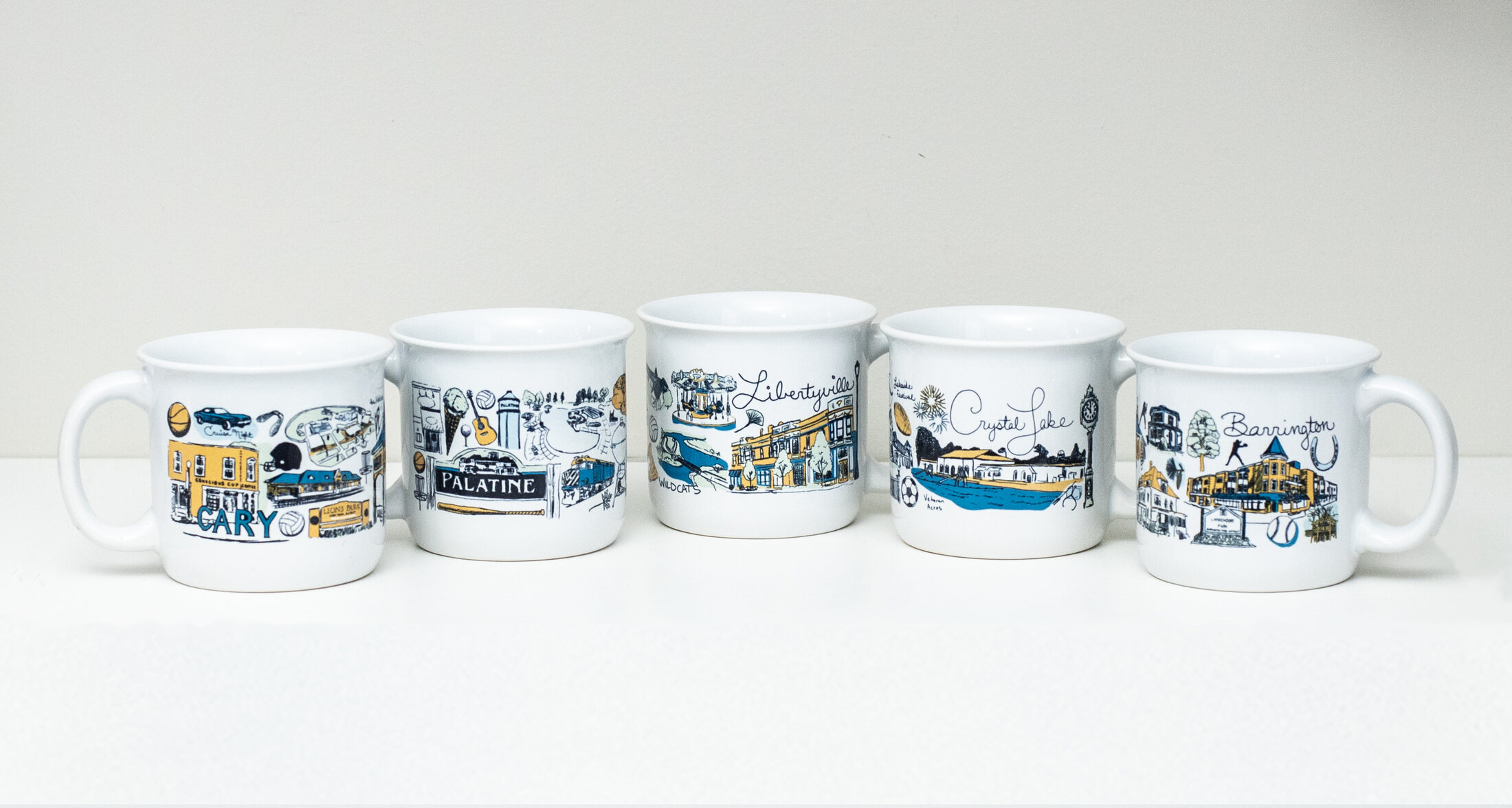 The original five-mug Conscious Cup hometown collection by Artist Ashley Ann