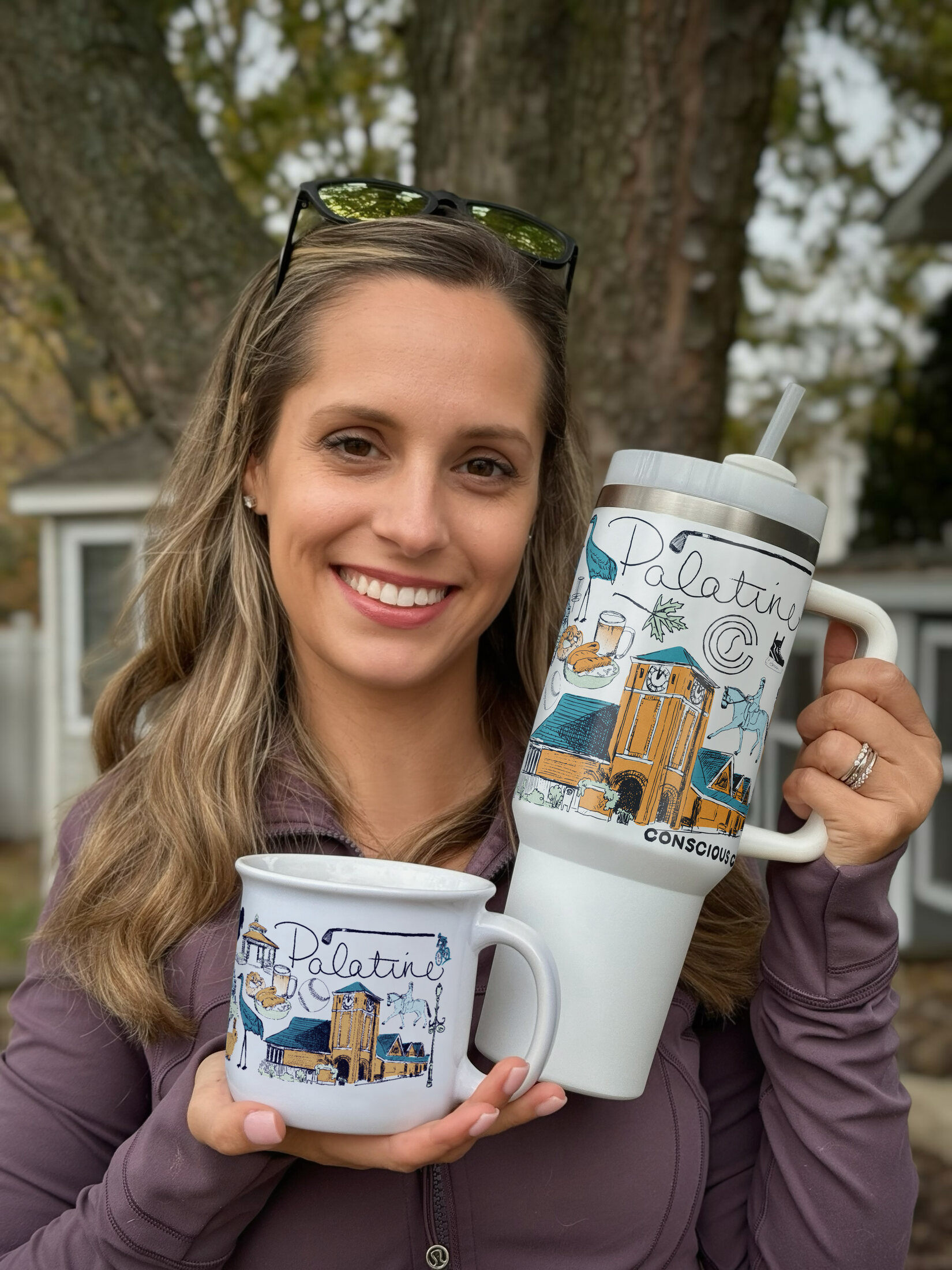 Ashley Ann holding The Palatine Mug and matching tumbler