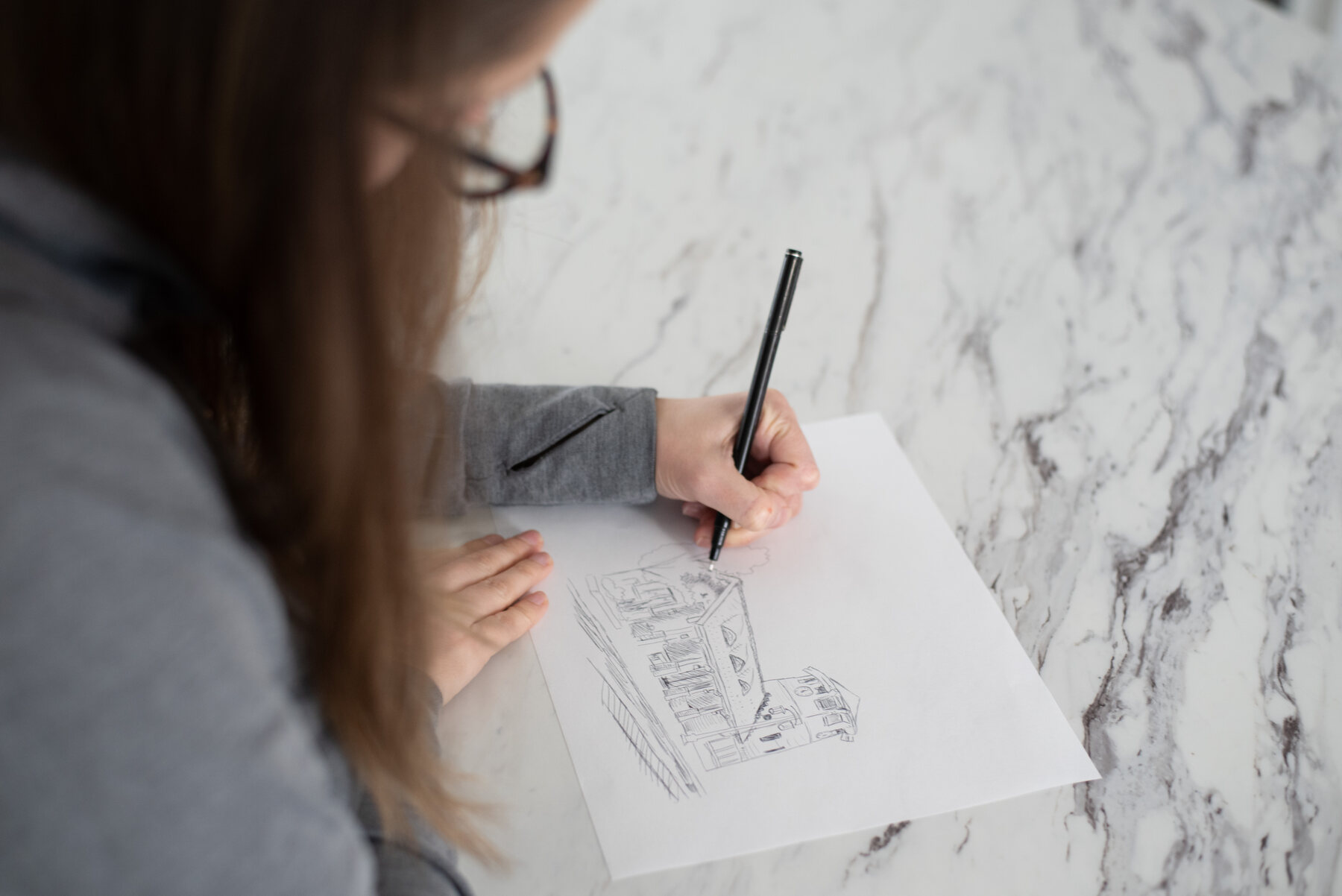 Ashley Ann hand drawing community mug artwork