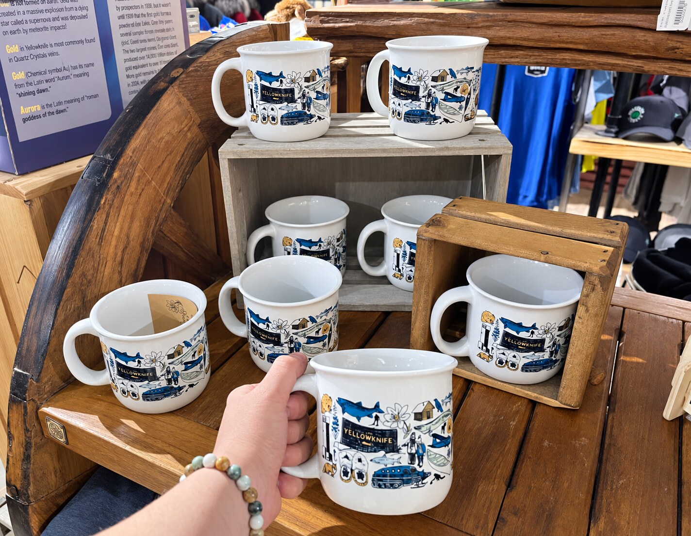 Yellowknife Mugs displayed among northern gifts at The Cabin in Yellowknife Airport